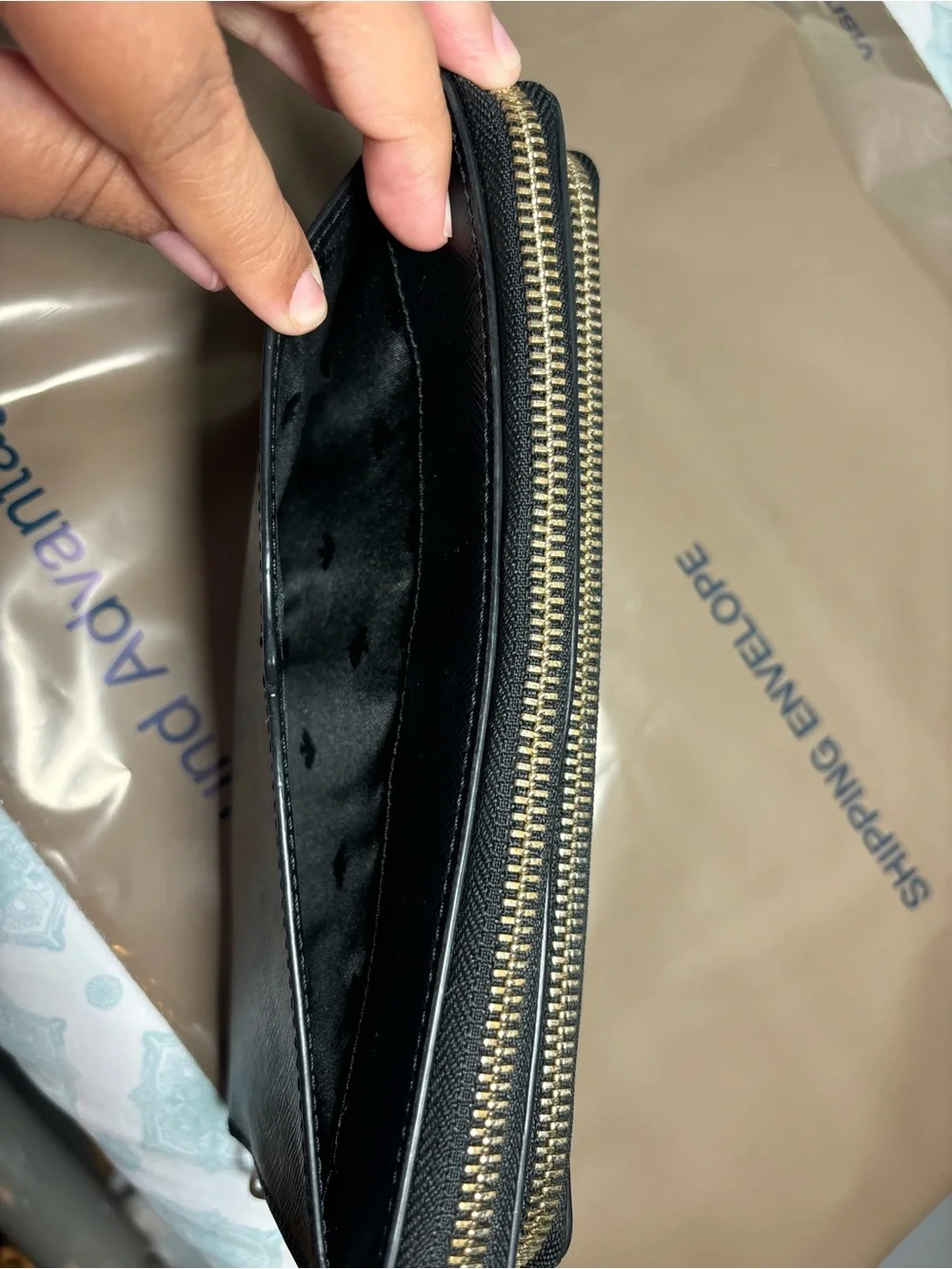 kate spade Black Zip-Around Saffiano Wristlet